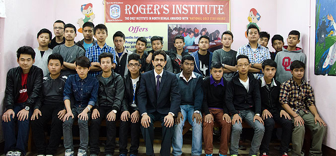 Mr. Claudius Singh Rasaily with students