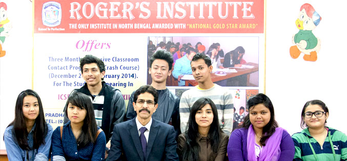 Mr. Claudius Singh Rasaily with students